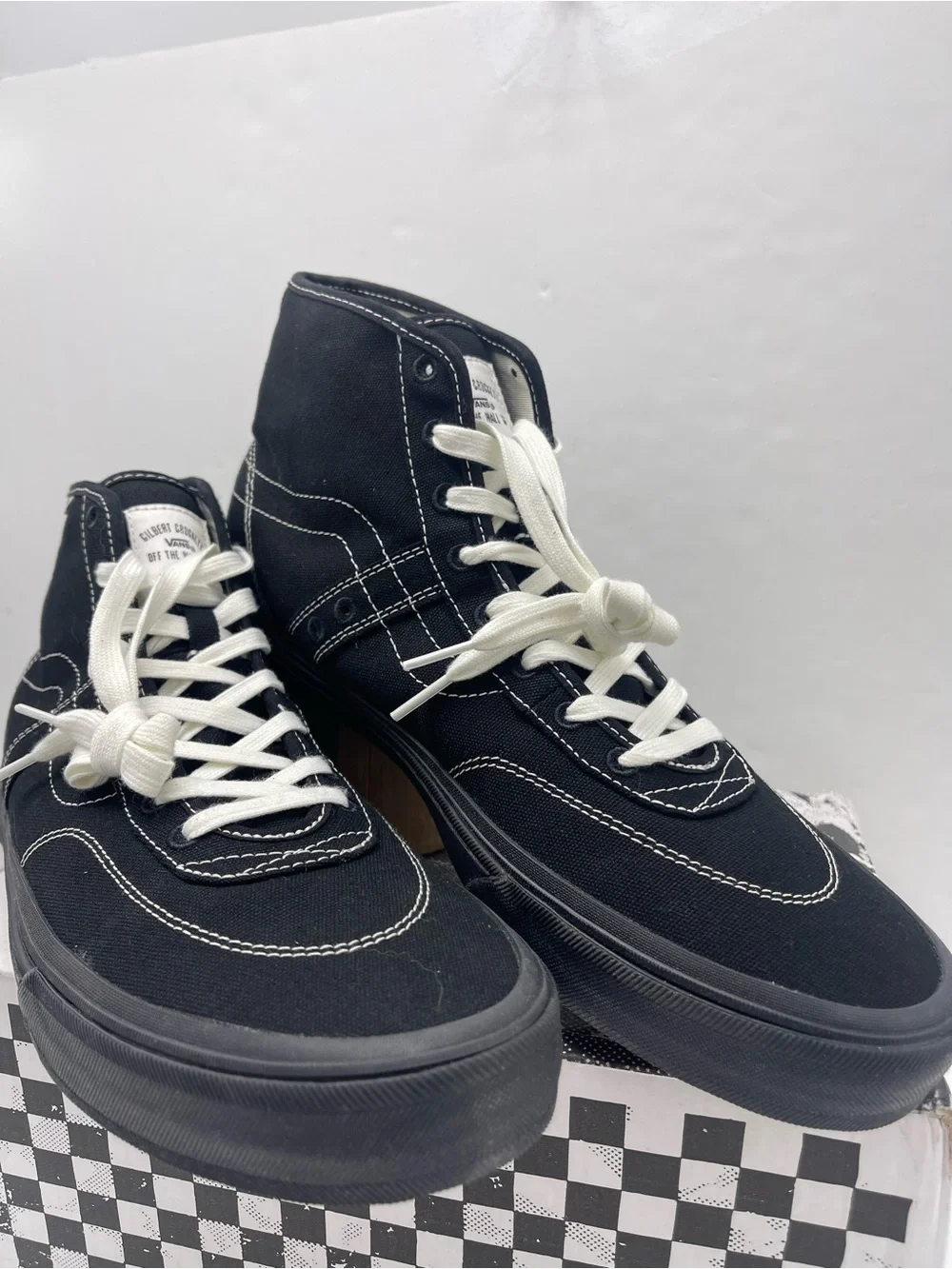 Vans Men’s High-Top Canvas Sneakers in Black and White